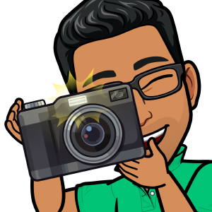 Bitmoji character taking a photo